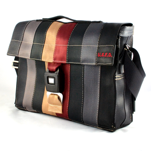 Messenger bag with clearance seat belt buckle